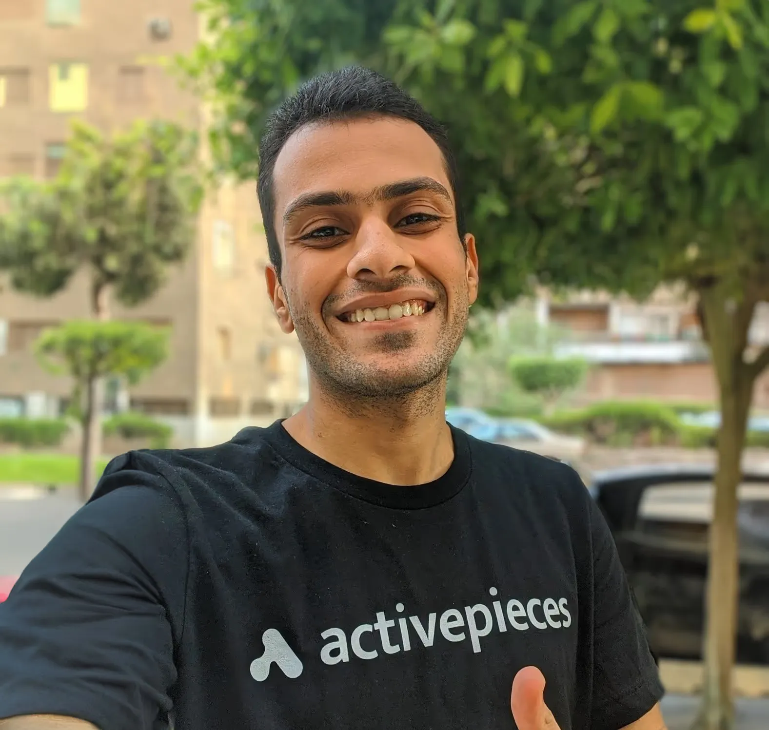 Employee wearing Activepieces swag